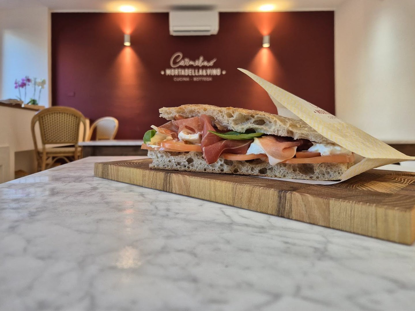 Carmelino – Mortadella e Vino, Malgrate