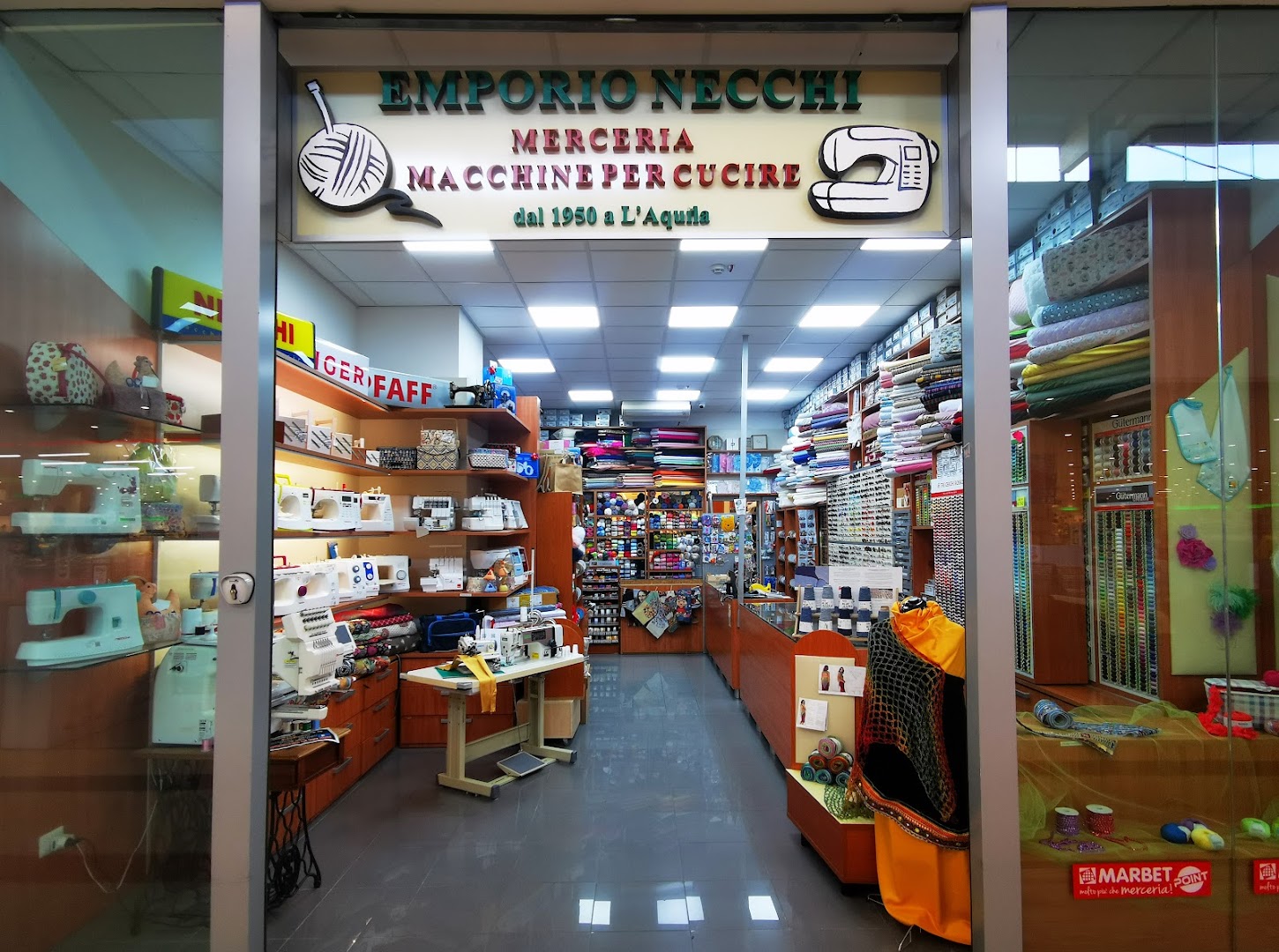 Emporio Necchi, L'Aquila