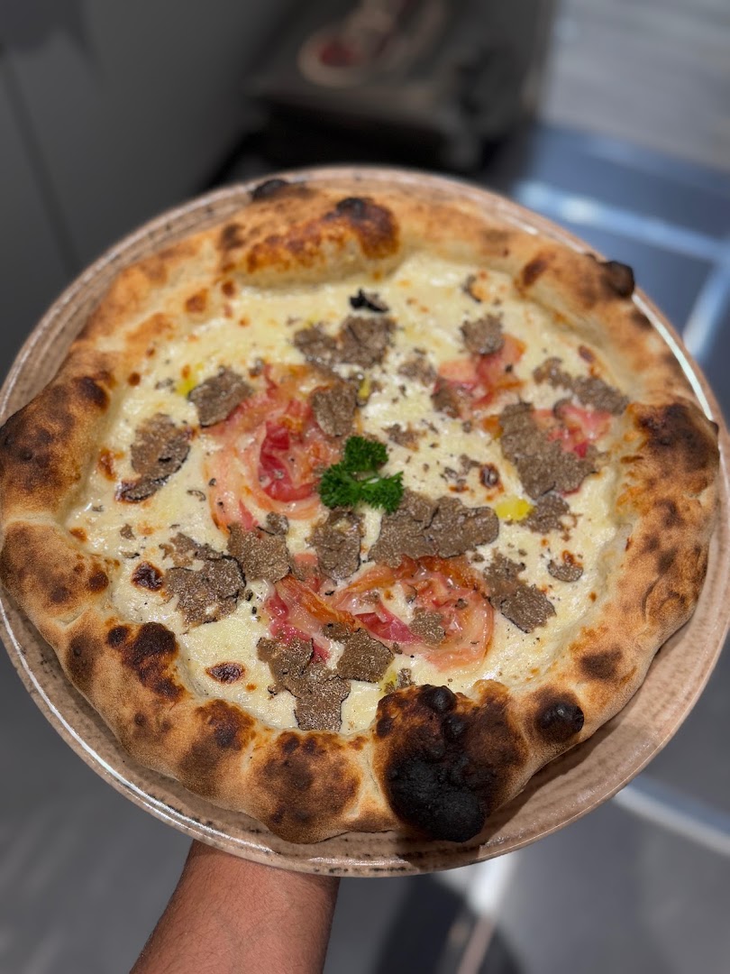 Origini cucina e pizza, Reggio nell'Emilia