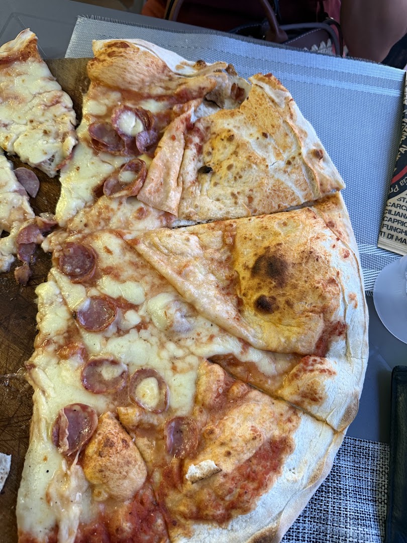 Pizzeria Da Carlo Budoni - Pizze con Consegna a Domicilio