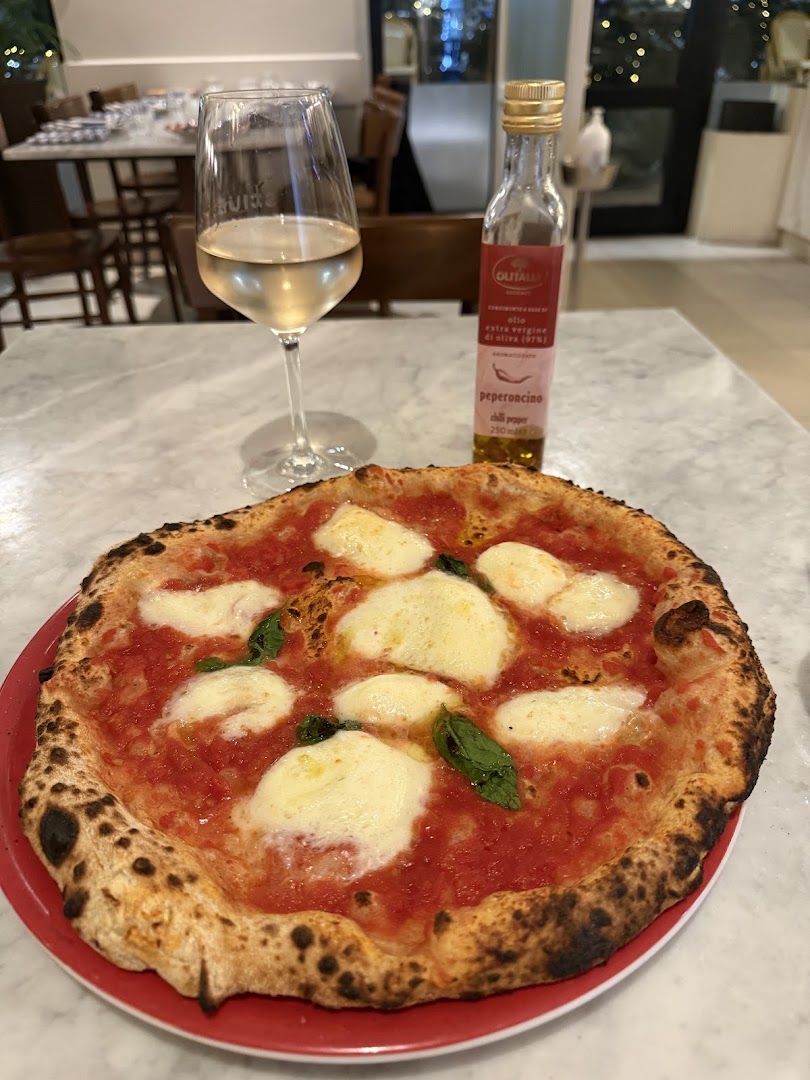 Sciué Premuda, Milano